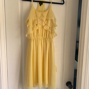 Pale yellow dress with a tie belt